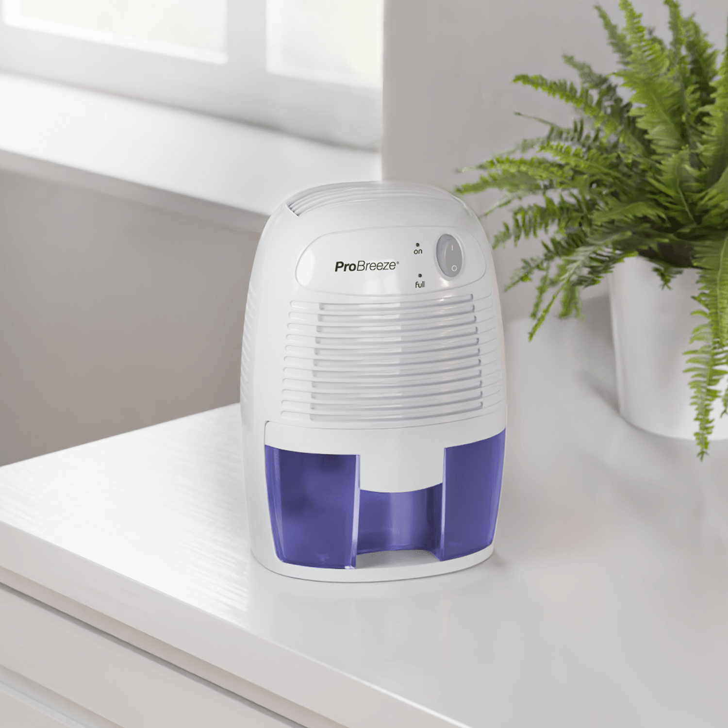 1200 Cubic Feet (205 sq. ft) Electric Mini Dehumidifier - Compact & Portable